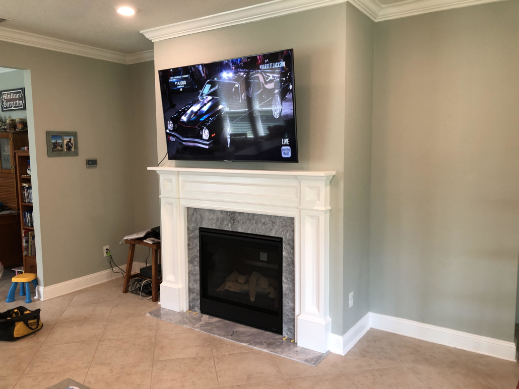 Gas Fireplace with Marble Surround and White Mantel